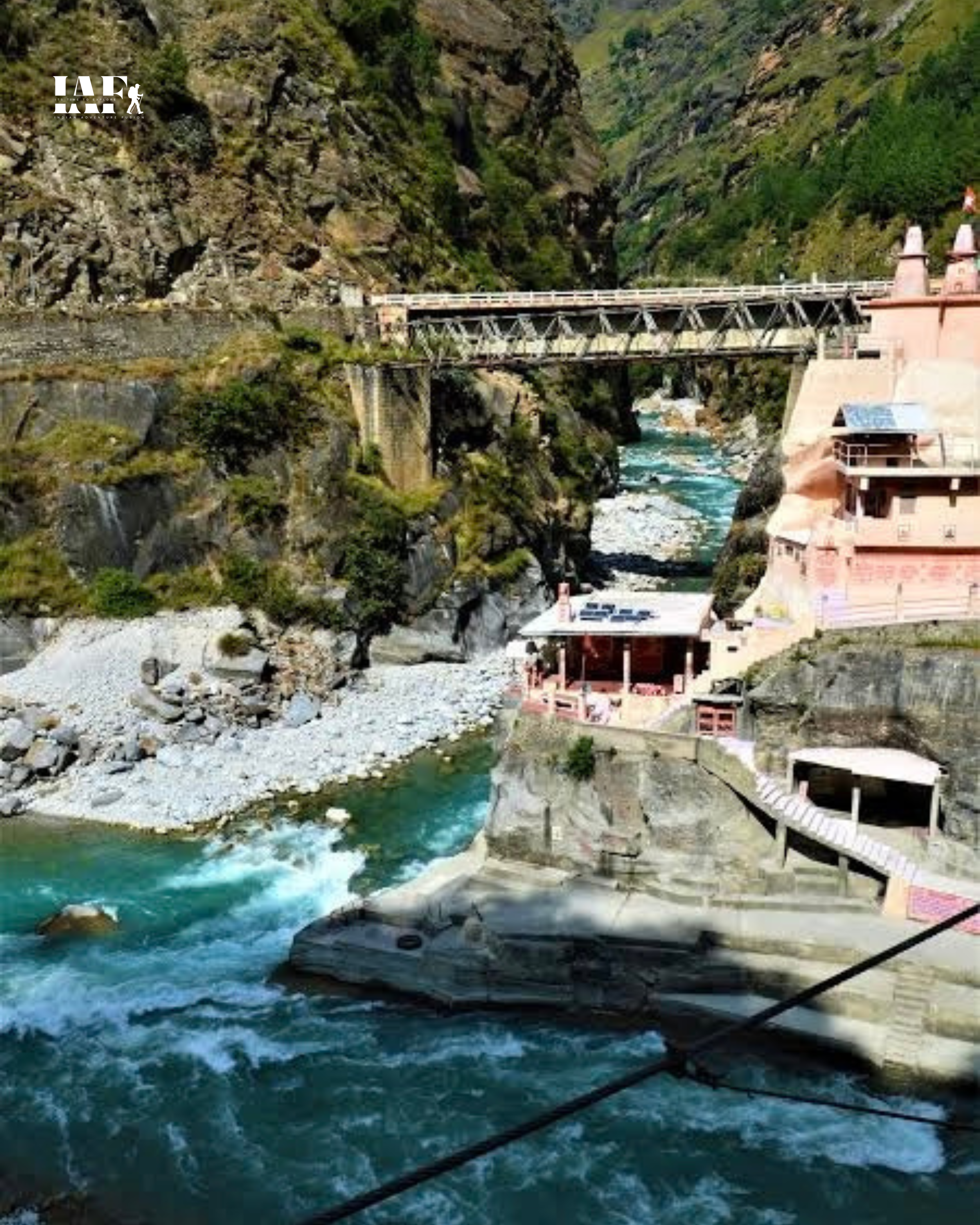Vishnuprayag confluence of Alaknanda and Dhauliganga rivers in Uttarakhand with temple and bridge.