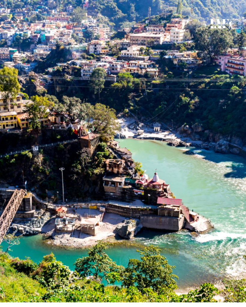 Rudraprayag confluence of Alaknanda and Mandakini rivers with temple and town view in Uttarakhand.