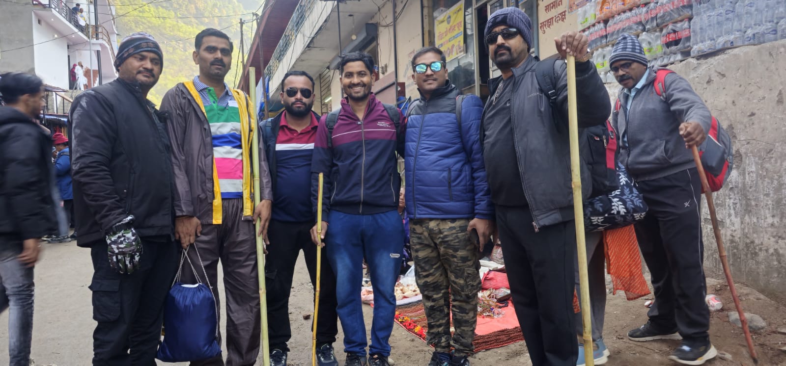 Group of travelers enjoying a scenic Himalayan viewpoint during their Uttarakhand trip